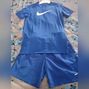 Nike Kids Blue Short Sleeve Tee and Shorts Set. Shorts-Lg/Top-Med.
